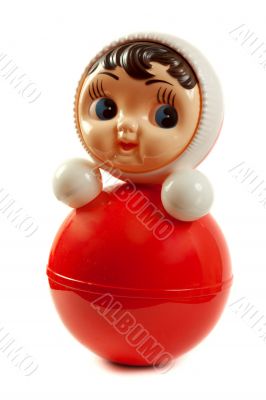 Red plastic doll insulated