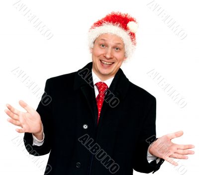 Man in suit and red tie in hat santa