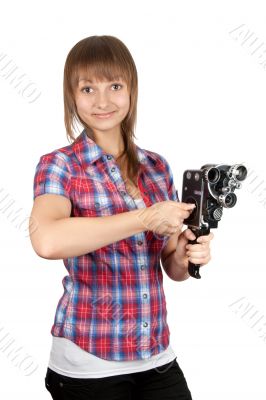 Girl in plaid shirt with charges movie camera