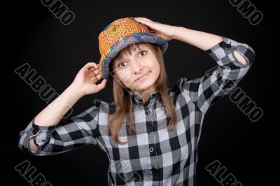 Beautiful girl in colour hat