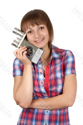 Girl in plaid shirt with movie camera