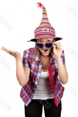 Beautiful girl smiles in sunglasseses and colour hat