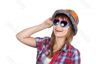 Beautiful girl smiles in sunglasseses and colour hat