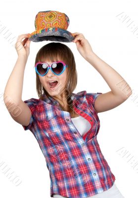 Beautiful girl smiles in sunglasseses and colour hat