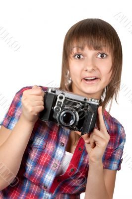 Young girl with old analog photo by camera