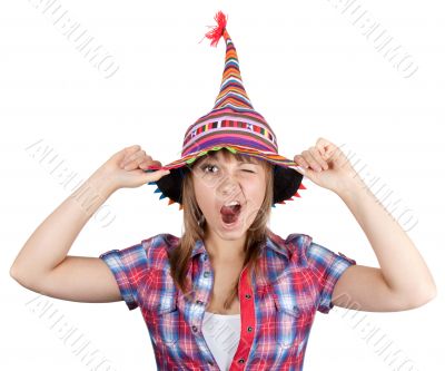 Young beautiful girl in colour hat