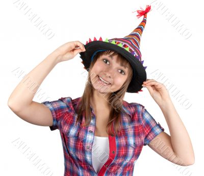 Young beautiful girl in colour hat