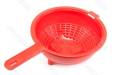 Red brilliant plastic colander