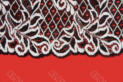 Black lace insulated on red background