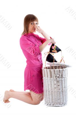 Girl takes out of basket for linen bra