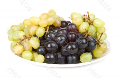 Plate with ripe grape