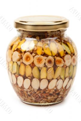 Nuts canned in glass bank