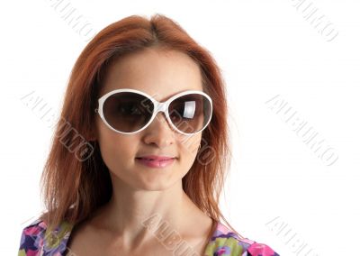 Portrait of the beautiful girl in sunglasseses