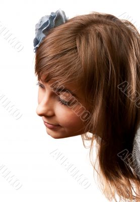 Portrait of the young girl in flower in hair