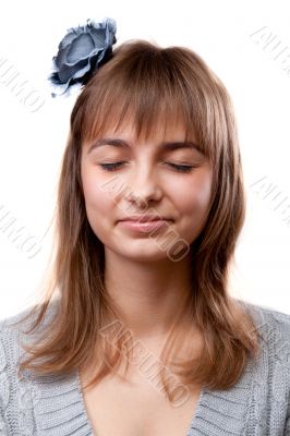 Portrait of the young girl with closed eye