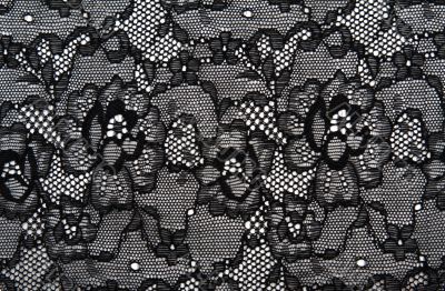 Background from black lace with pattern with form flower