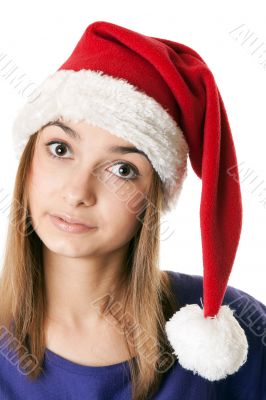 Beautiful girl in red Santa hat