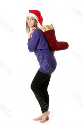 Beautiful girl in red Santa hat 
