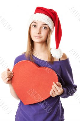 Beautiful girl in red Santa hat
