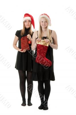 Two girls in the Santa hat