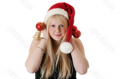 Young beautiful girl in a Santa hat