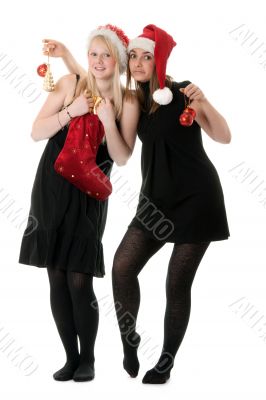 Two girls in the Santa hat