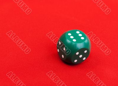 Green plastic dice