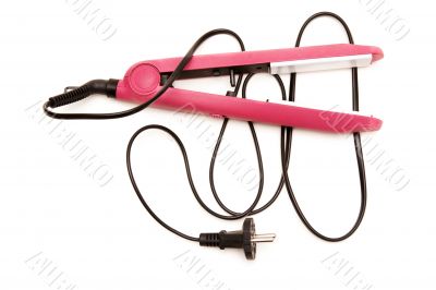 Electric pink hair straightener