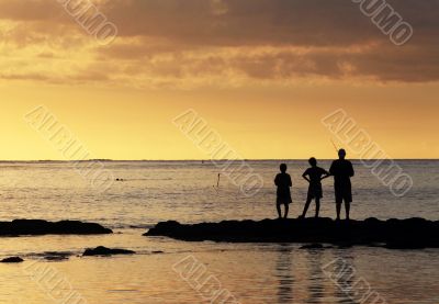 Three young fishermen