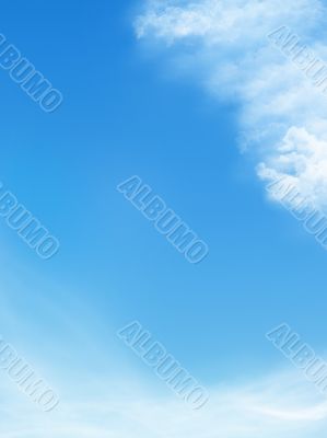 blue sky is covered by white clouds