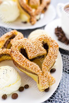 heart-shaped pastry with sesame seeds