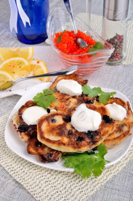 Fried pancakes with blackcurrant  