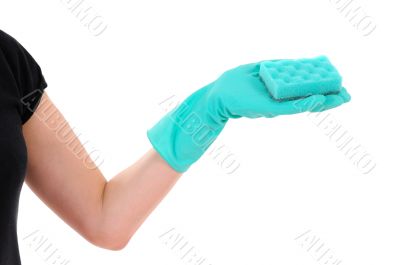 green sponge in hand