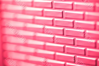 Wall of metallic bricks