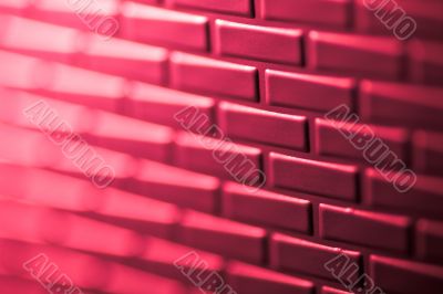 Wall of metallic bricks