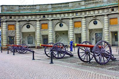Guns and guard near the Royal Palace in Stockholm Guns and guard near the Royal Palace in Stockholm