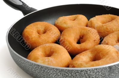 Donuts in a frying pan