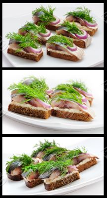 Sandwiches of rye bread with herring, onions and herbs.