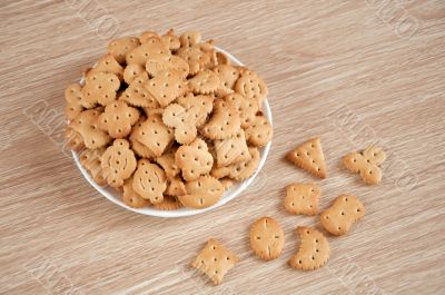 Children figured crackers on a plate Children figured crackers on a plate