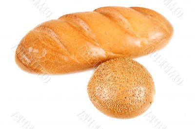 Sliced bread and bun with sesame seeds