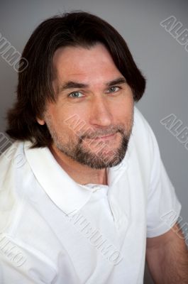 Portrait of middle-aged man with a gray background Portrait of middle-aged man with a gray background