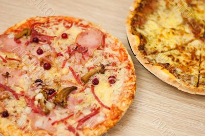 Appetizing pizza with mushrooms and ham Appetizing pizza with mushrooms and ham