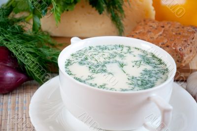 Cheese soup with dill and cereal bread