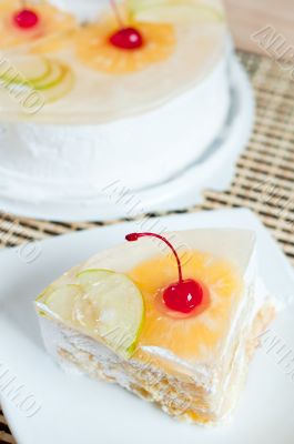 Fruit cake with cherries, pineapple and apple. Fruit cake with cherries, pineapple and apple.