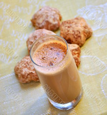 A delicious chocolate drink with biscuits