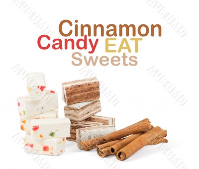 Sweets and cinnamon sticks isolated on white background