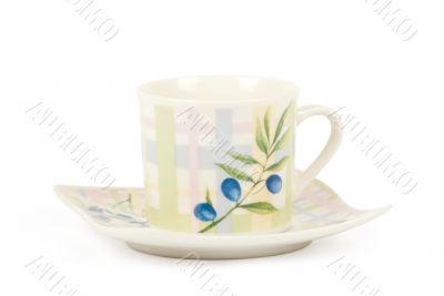 Fine china cup and saucer filled  isolated on white