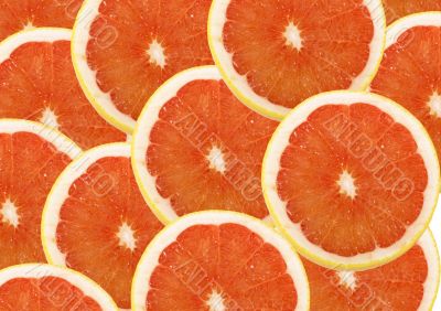 fresh grapefruit and slices background