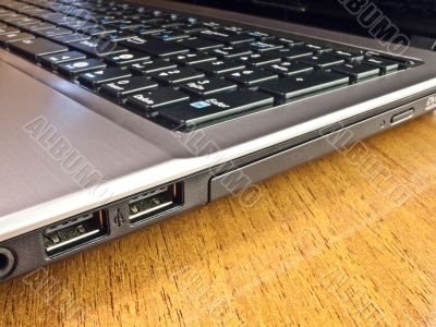 The laptop on a wooden desk