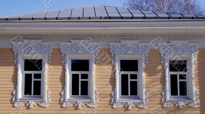 4 windows of wooden house